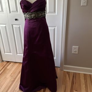 Size 8 plum colored prom gown with waistband beading underskirt tulle